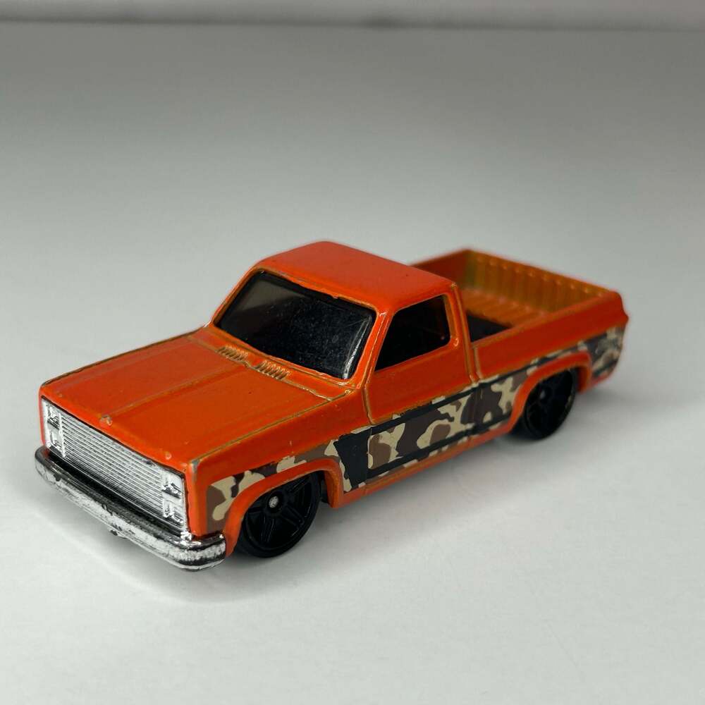 Hot Wheels 83 Chevy Silverado Orange Camouflage Truck